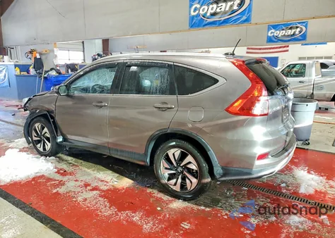 2016 Honda Cr-V Touring z USA, uszkodzony, nr VIN 5J6RM4H96GL087945